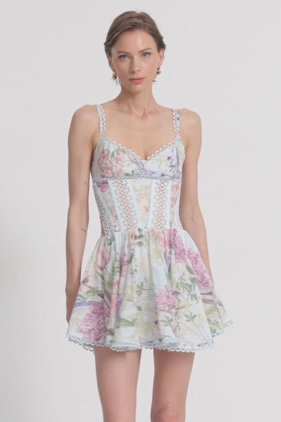 The Gardenia Mini Dress captures the essence of Ibiza elegance with its flowing silhouette and delicate floral pattern. This lightweight blue mini features a relaxed, feminine cut that moves beautifully with you, making it perfect for summer gatherings, cocktail events, and evening outings. The airy design offers effortless comfort while maintaining a sophisticated, editorial appeal—ideal for creating memorable looks on special occasions.