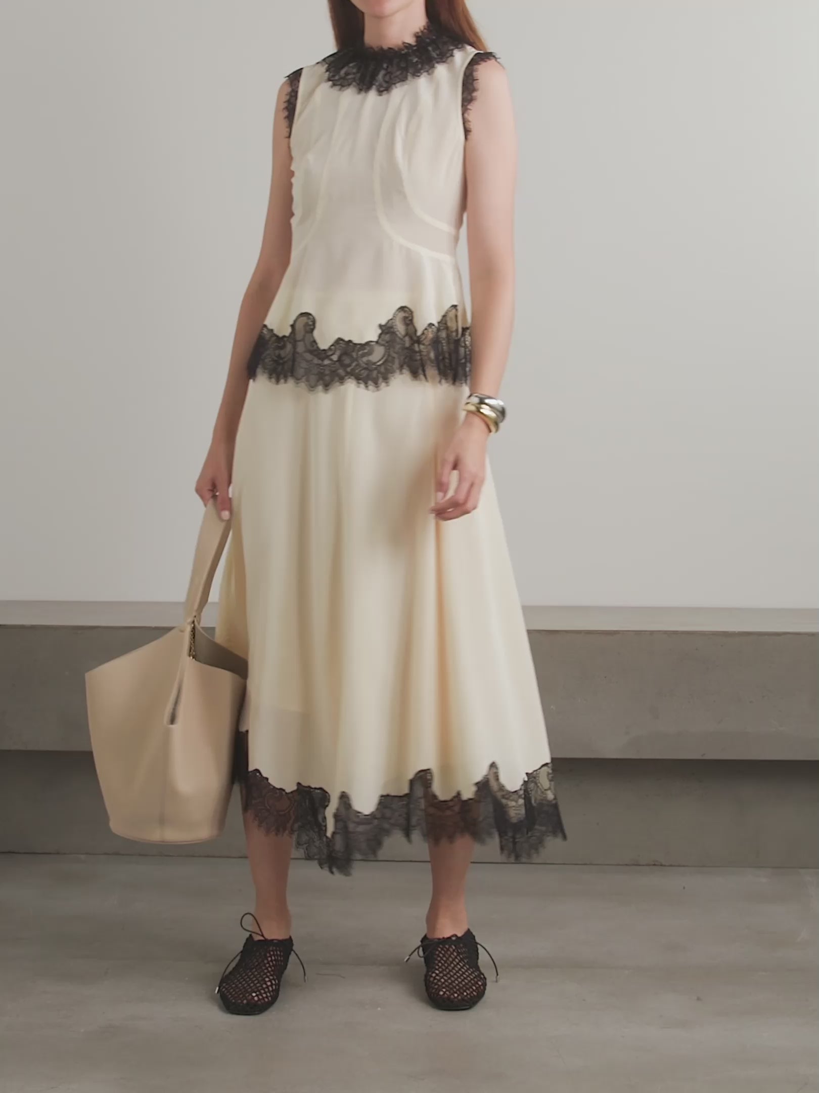 Ulla Johnson’s Rosine Midi Skirt offers timeless elegance with its fluid silk crepe de chine fabric and relaxed A-line silhouette. The delicate contrasting lace trim on the asymmetric hem adds a distinctive vintage flair. Perfectly paired with the matching Bette top, this skirt effortlessly elevates your wardrobe for both casual and special occasions.