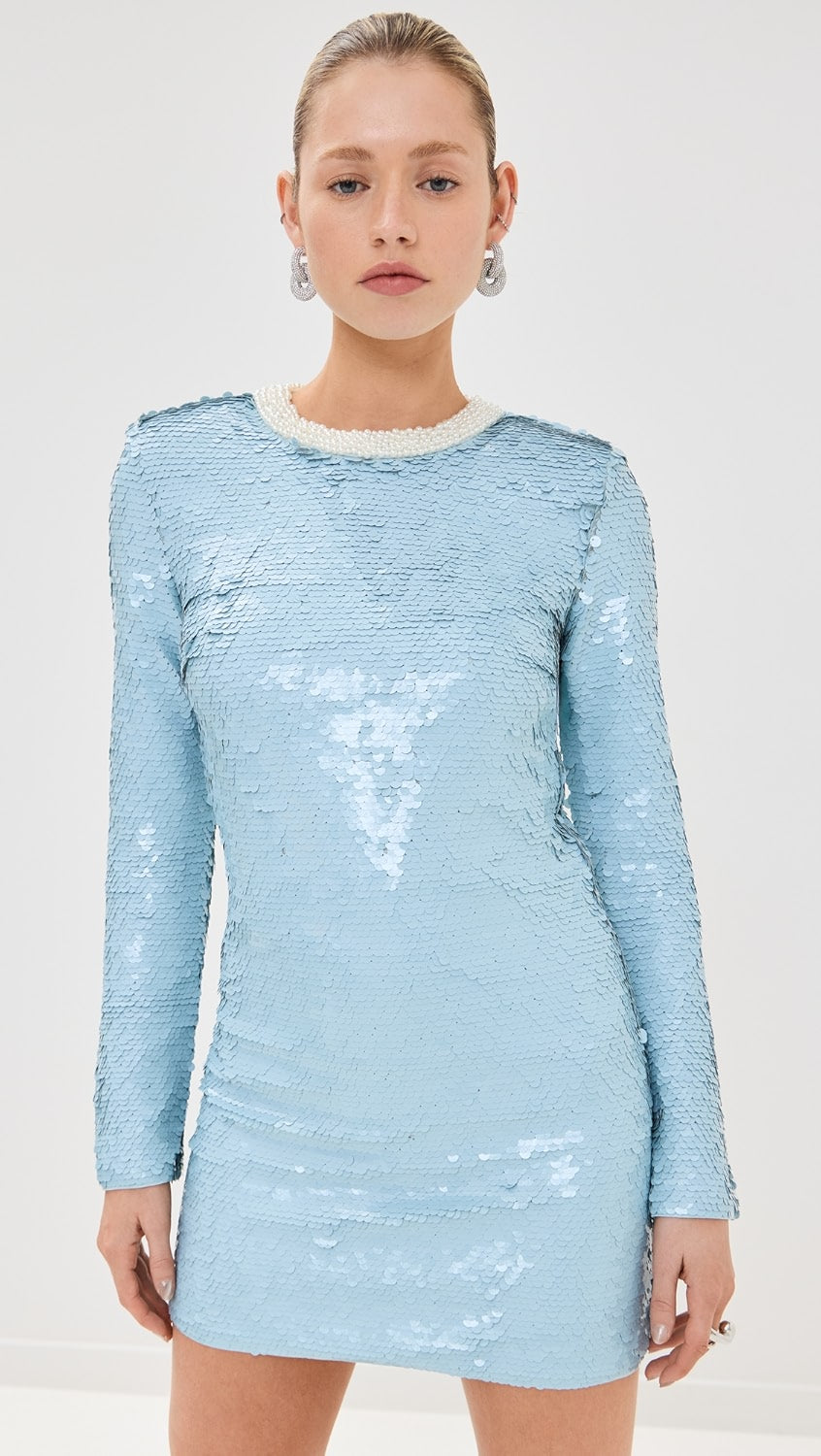 Elevate your style with the Blue Sequin Mini Dress! This mid-weight, non-stretch sequined mesh dress features contrast beaded trim, padded shoulders, and a mini length for a dazzling look. With a crew neck, long sleeves, and hook-and-eye and hidden zip closure at the back, this dress is both chic and comfortable.