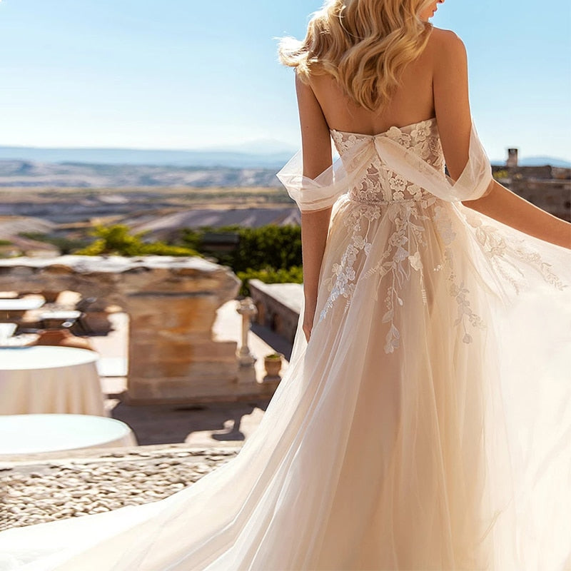 Indulge in pure elegance with our Robe Abrita. This luxurious bridal gown is both elegant and sexy, perfect for any princess bride. Its mermaid silhouette will make you feel like royalty on your special day. Embrace your inner goddess with the Abrita.