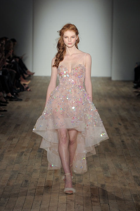 Indulge in luxury with our Robe Caila. This sparkling crystal embellished cocktail gown is a true work of art, exquisitely crafted to make you stand out at any event. Elevate your style and make a statement with this elegant and exclusive piece.