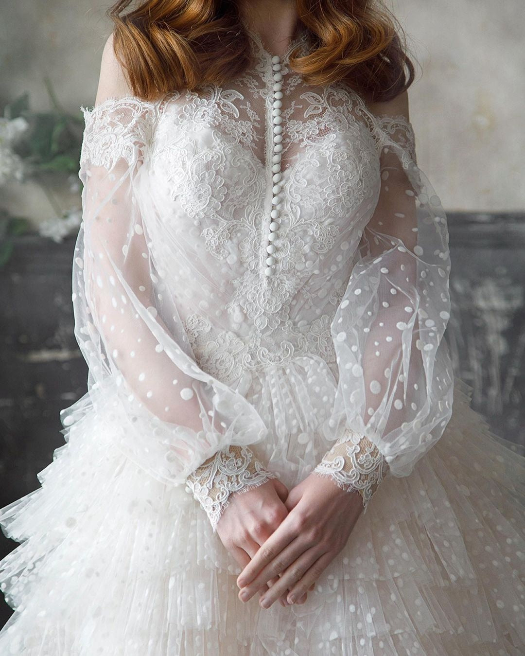 Indulge in the opulence of the Robe Domini. This luxurious white ruffled princess ball gown exudes elegance and sophistication. Designed to make you feel like a modern-day princess, it is perfect for any special occasion. With its intricate ruffles and regal silhouette, this gown is a true work of art. Elevate your wardrobe and make a statement with the Robe Domini.