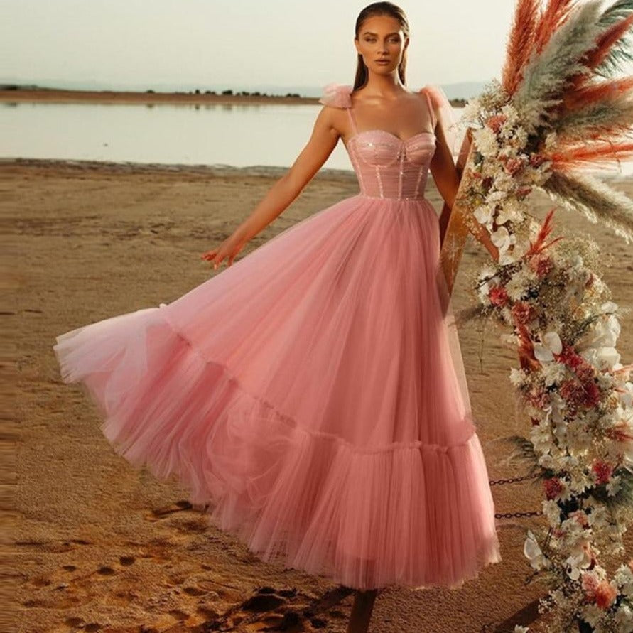 This elegant ball gown sparkling dress, named Robe Jackalinne, is perfect for any formal occasion. Made with high-quality materials, it will ensure a glamorous and unforgettable look. Its sparkling details will catch the eye and make you stand out in the crowd.