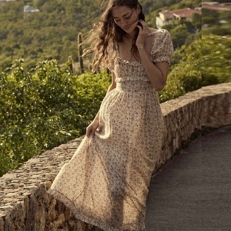 Indulge in luxury with the Gia Dress from Doen. Made with ruffle floral printed cotton, this midi maxi gown dress exudes elegance and sophistication. Its ruffled detailing adds a touch of femininity, making it the perfect statement piece for any occasion. Elevate your wardrobe with this exclusive and tasteful dress.