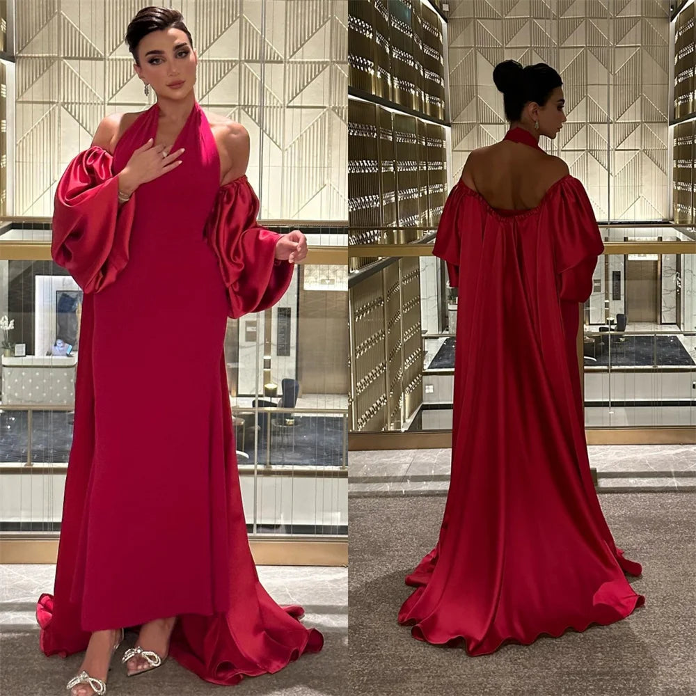 Indulge in glamour with our Robe Leilane. This stunning satin prom dress boasts a halter neck and off the shoulder design, exuding sophistication and confidence. Make a statement at any event with this luxurious piece.